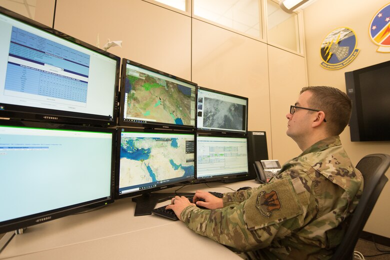 Tech. Sgt. Matthew O'Neill working at a computer.