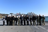U.S. 7th Fleet and Blue Ridge Sailors pose for a photo with Republic of Korea Navy personnel prior to a medical demonstration held aboard U.S. 7th Fleet flagship, USS Blue Ridge. Blue Ridge with embarked U.S. 7th Fleet Sailors arrived in Busan, Republic of Korea (ROK) for a regularly scheduled port visit Feb. 5. During their visit they will engage in local culture, hose military-to-military engagements and build relationships through music and public service activities.