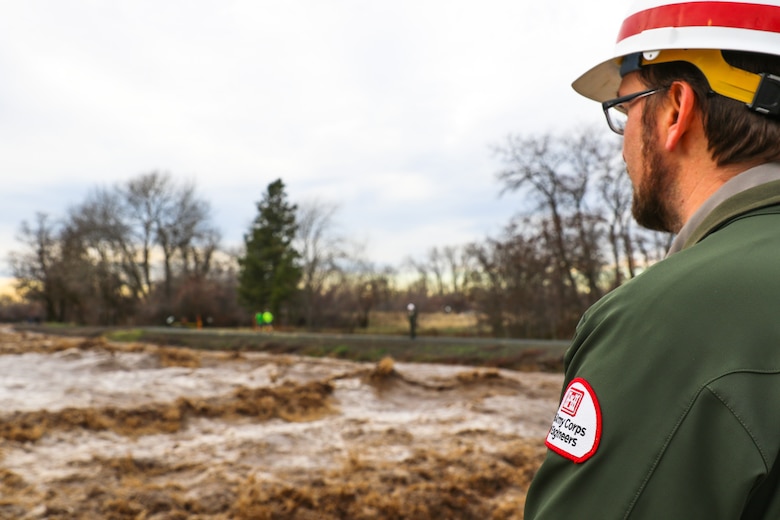 Natural Resources Manager Chris Alford monitoring Mill Creek flows.