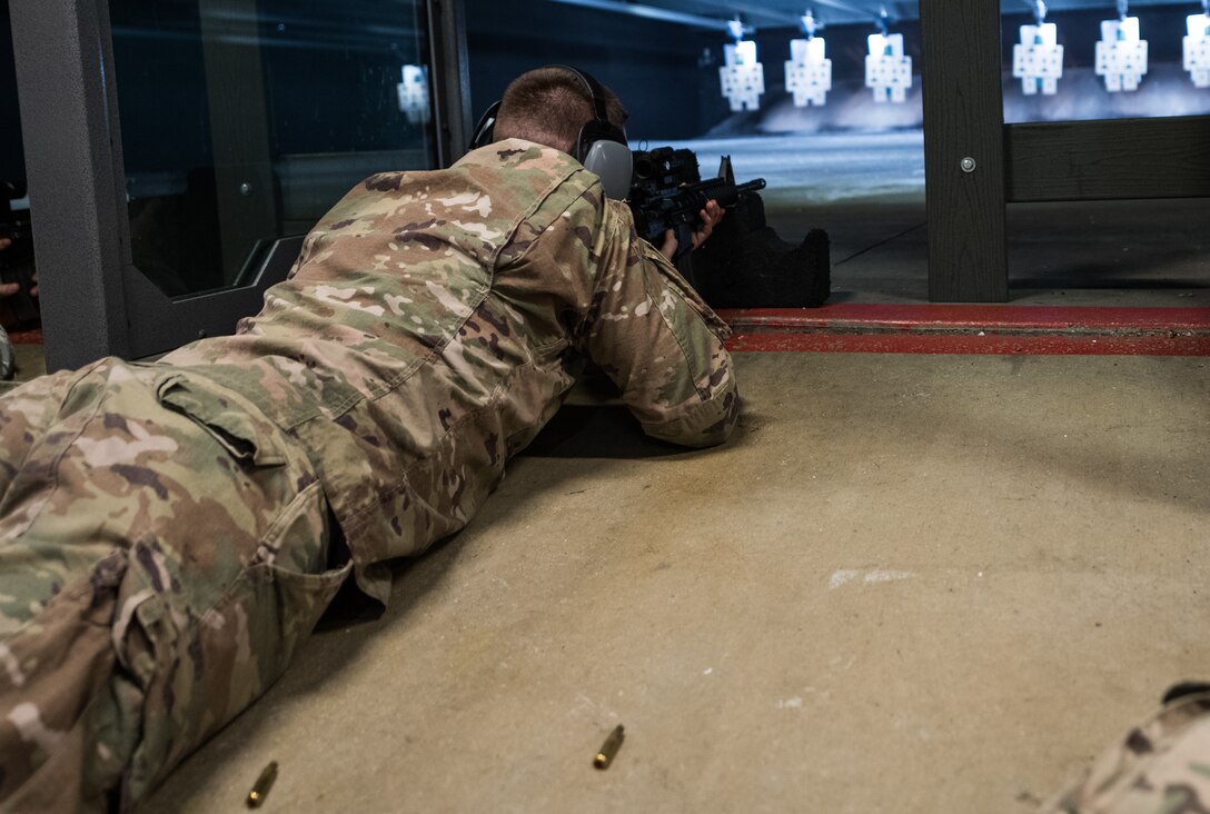 Citizen Airmen with the 932nd Airlift Wing participate in M4 rifle qualification, Scott Air Force Base, Illinois, Feb. 8, 2020. The course sharpens their weapon systems skills and ensures optimal performance of the firearms they carry daily. (U.S. Air Force photo by Senior Airman Brooke Deiters)