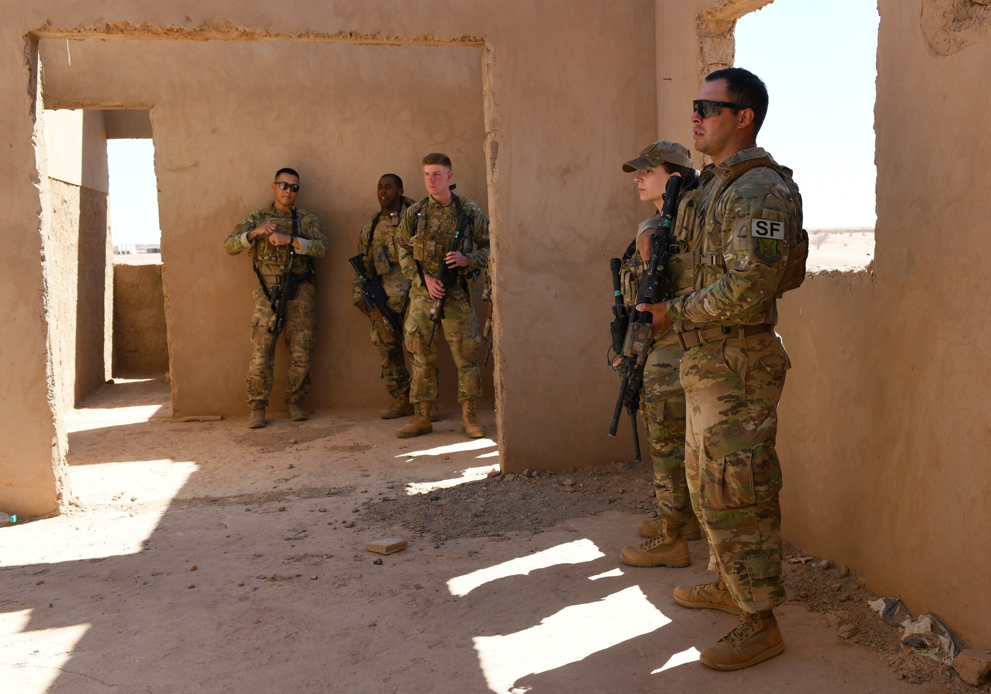 U.S. Air Force 409th Expeditionary Security Forces Squadron Response Force team members deployed to Nigerien Air Base 201 participate in a close quarters battle refresher course in Agadez, Niger, Feb. 5, 2020. During the course, the Defenders brushed up on the fundamentals of weapon manipulation, room clearing, and engaging threats with bystanders and hostages. (U.S. Air Force Photo by Tech. Sgt. Alex Fox Echols III)
