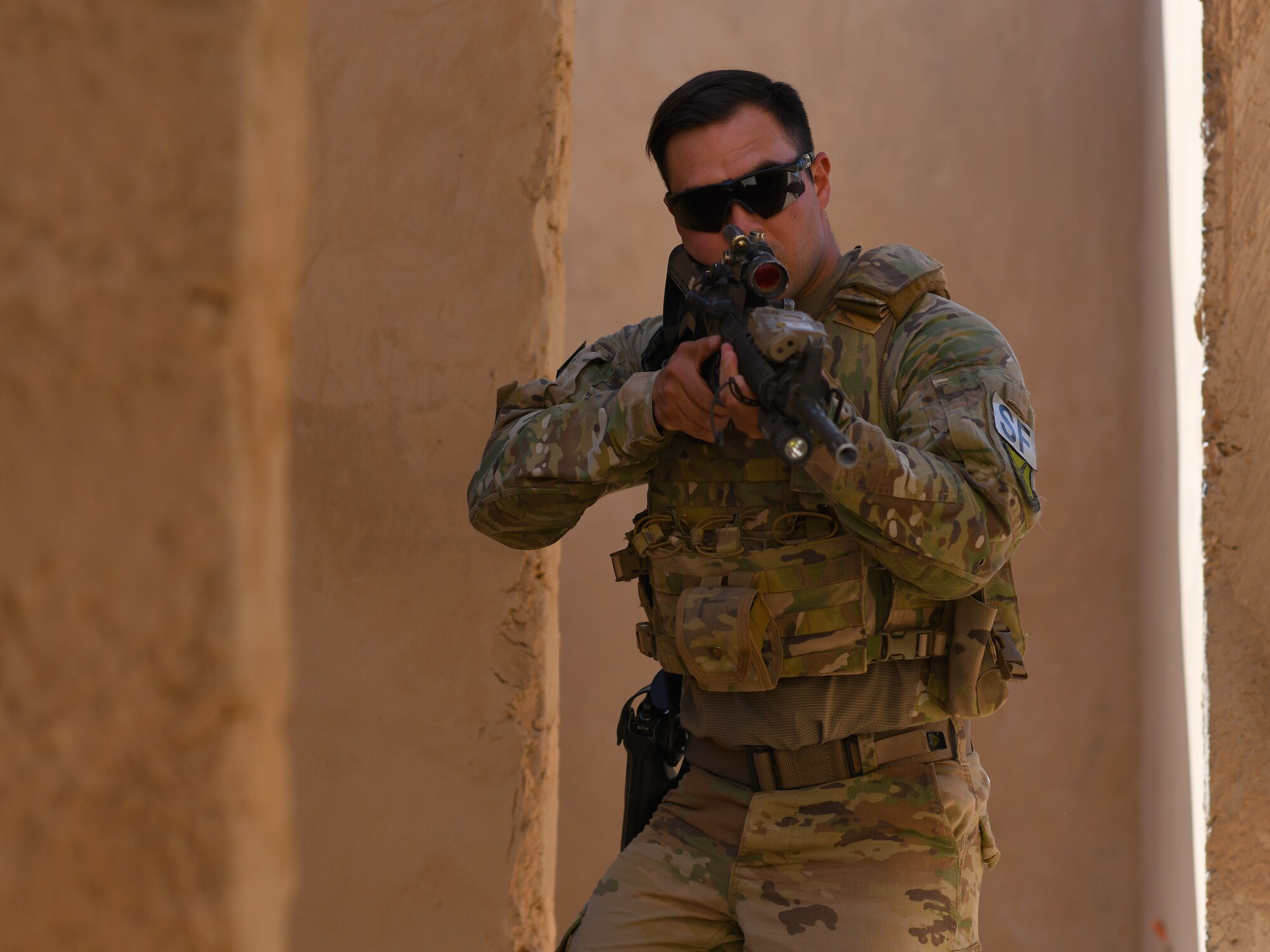 U.S. Air Force Senior Airman Dario Flores, 409th Expeditionary Security Forces Squadron Response Force team member, conducts building clearing procedures during a close quarters battle refresher course at Nigerien Air Base 201, Niger, Feb. 5, 2020. During the course, the Defenders brushed up on the fundamentals of weapon manipulation, room clearing, and engaging threats with bystanders and hostages. (U.S. Air Force Photo by Tech. Sgt. Alex Fox Echols III)