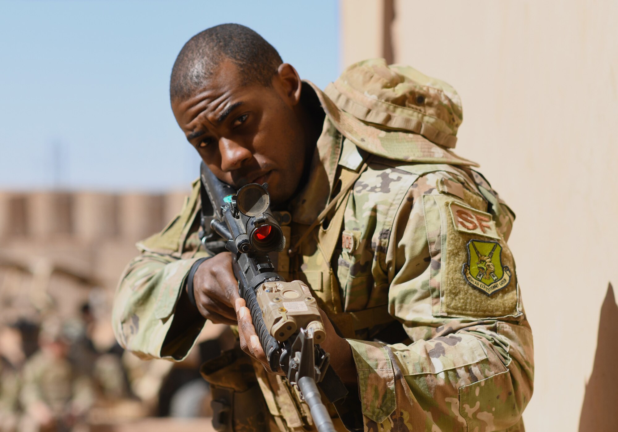 U.S. Air Force Senior Airman Tyreese Evans, 409th Expeditionary Security Forces Squadron Response Force team member, conducts building clearing procedures during a close quarters battle refresher course at Nigerien Air Base 201, Niger, Feb. 5, 2020. During the course, the Defenders brushed up on the fundamentals of weapon manipulation, room clearing, and engaging threats with bystanders and hostages. (U.S. Air Force Photo by Tech. Sgt. Alex Fox Echols III)