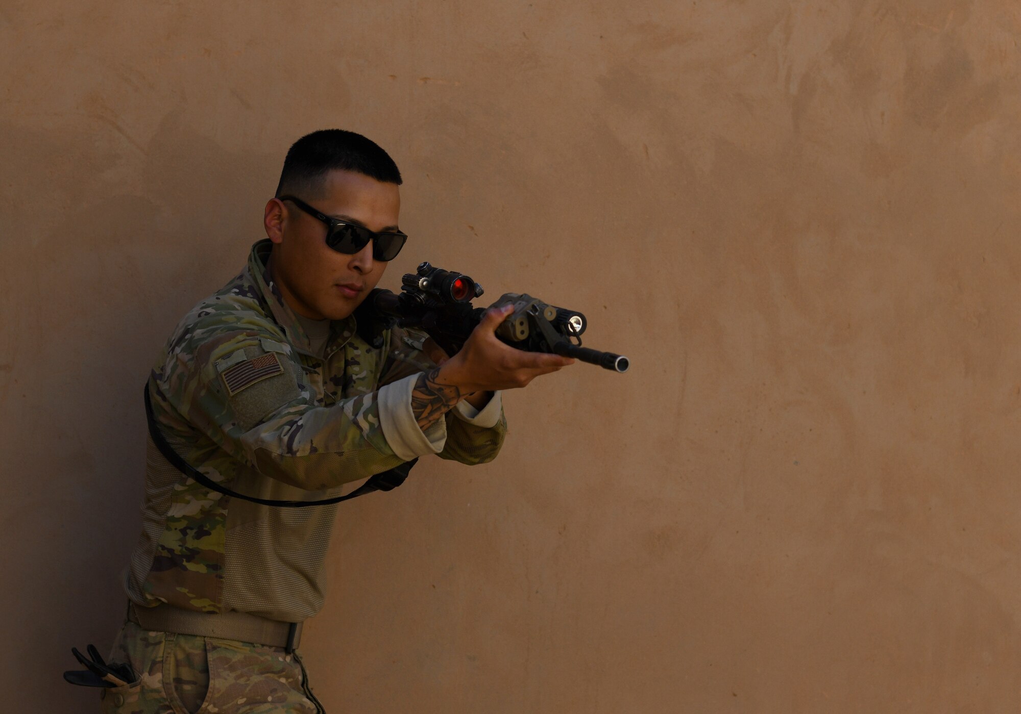 U.S. Air Force Senior Airman Brandon Troglia, 409th Expeditionary Security Forces Squadron Response Force team member, conducts building clearing procedures during a close quarters battle refresher course at Nigerien Air Base 201, Niger, Feb. 5, 2020. During the course, the Defenders brushed up on the fundamentals of weapon manipulation, room clearing, and engaging threats with bystanders and hostages. (U.S. Air Force Photo by Tech. Sgt. Alex Fox Echols III)