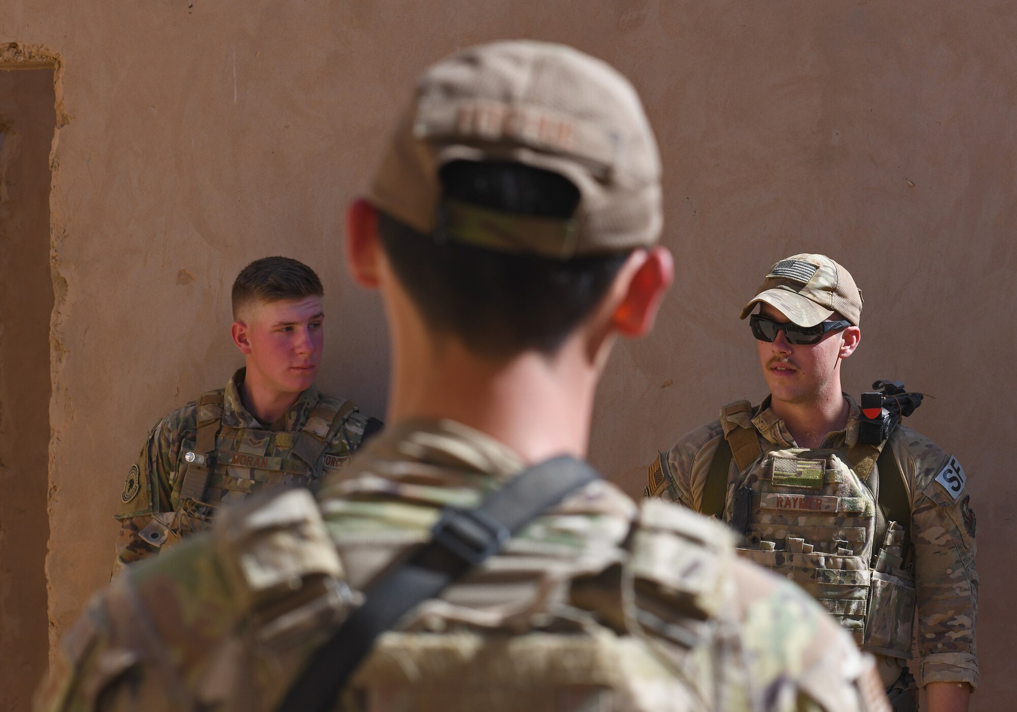 U.S. Air Force Airman 1st Class Matthew Raynor, right, 409th Expeditionary Security Forces Squadron Response Force team member, instructs participants of a close quarters battle refresher course at Nigerien Air Base 201, Niger, Feb. 5, 2020. During the course, the Defenders brushed up on the fundamentals of weapon manipulation, room clearing, and engaging threats with bystanders and hostages. (U.S. Air Force Photo by Tech. Sgt. Alex Fox Echols III)