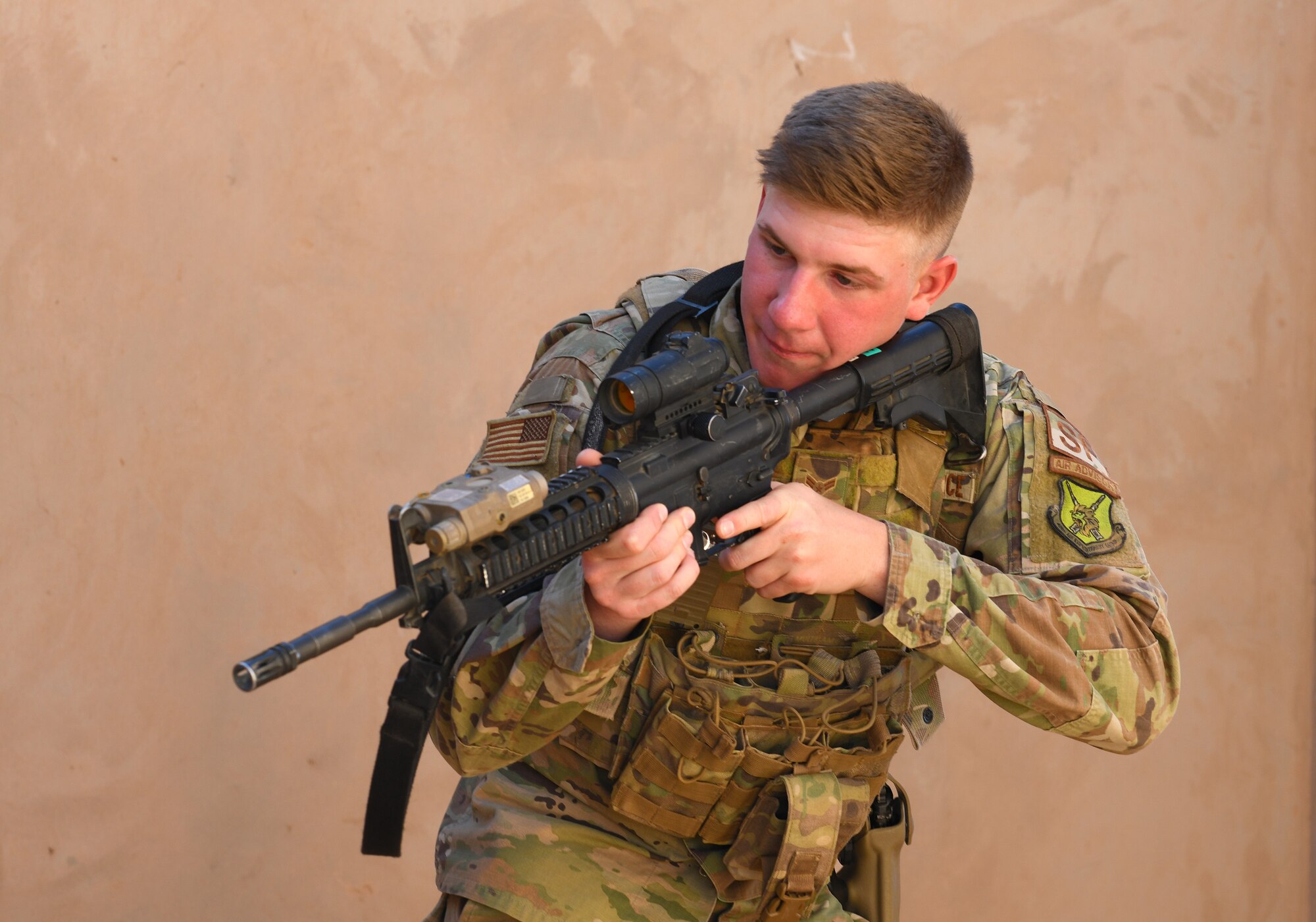 U.S. Air Force Airman 1st Class Ian Moran, 409th Expeditionary Security Forces Squadron Response Force team member, conducts building clearing procedures during a close quarters battle refresher course at Nigerien Air Base 201, Niger, Feb. 5, 2020. During the course, the Defenders brushed up on the fundamentals of weapon manipulation, room clearing, and engaging threats with bystanders and hostages. (U.S. Air Force Photo by Tech. Sgt. Alex Fox Echols III)