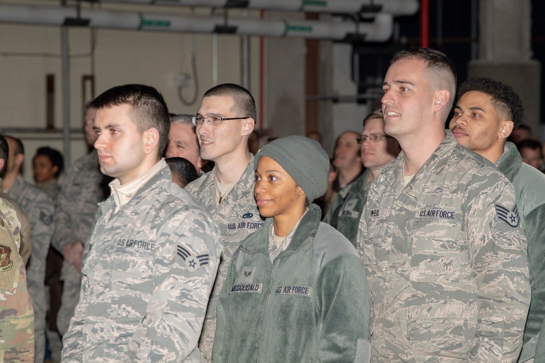U.S. Air Force members of the 916th Air Refueling Wing watches a video on the history of the KC-135 Stratotanker during the divestiture ceremony on Seymour Johnson Air Force Base, North Carolina, Feb. 8, 2020. The 916 ARW hosted the ceremony in honor of aircraft 349, the first KC-135 Stratotanker to be acquired by the 916 ARW and the last to be divested in the wing’s current conversion. (U.S. Air Force photo by Staff Sgt. Mary McKnight)