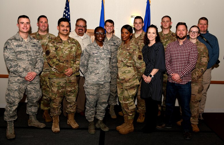 The 90th Missile Wing's fourth quarter award winners pose for a photo at F.E. Warren Air Force Base, Wyo., Feb. 7, 2020. The wing held a celebration for all the nominees and presented the awards to the winners during a ceremony. (U.S. Air Force photo by Tech Sgt. Tyler Placie)