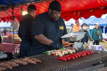 Vendors cook and serve food at Hansen festival, Camp Hansen, Okinawa, Japan, Feb. 8, 2020. The festival was held to bring members of the local and U.S. military communities together to build relationships through festivities and live performances. (U.S. Marine Corps photo by Lance Cpl. Zachary Larsen)