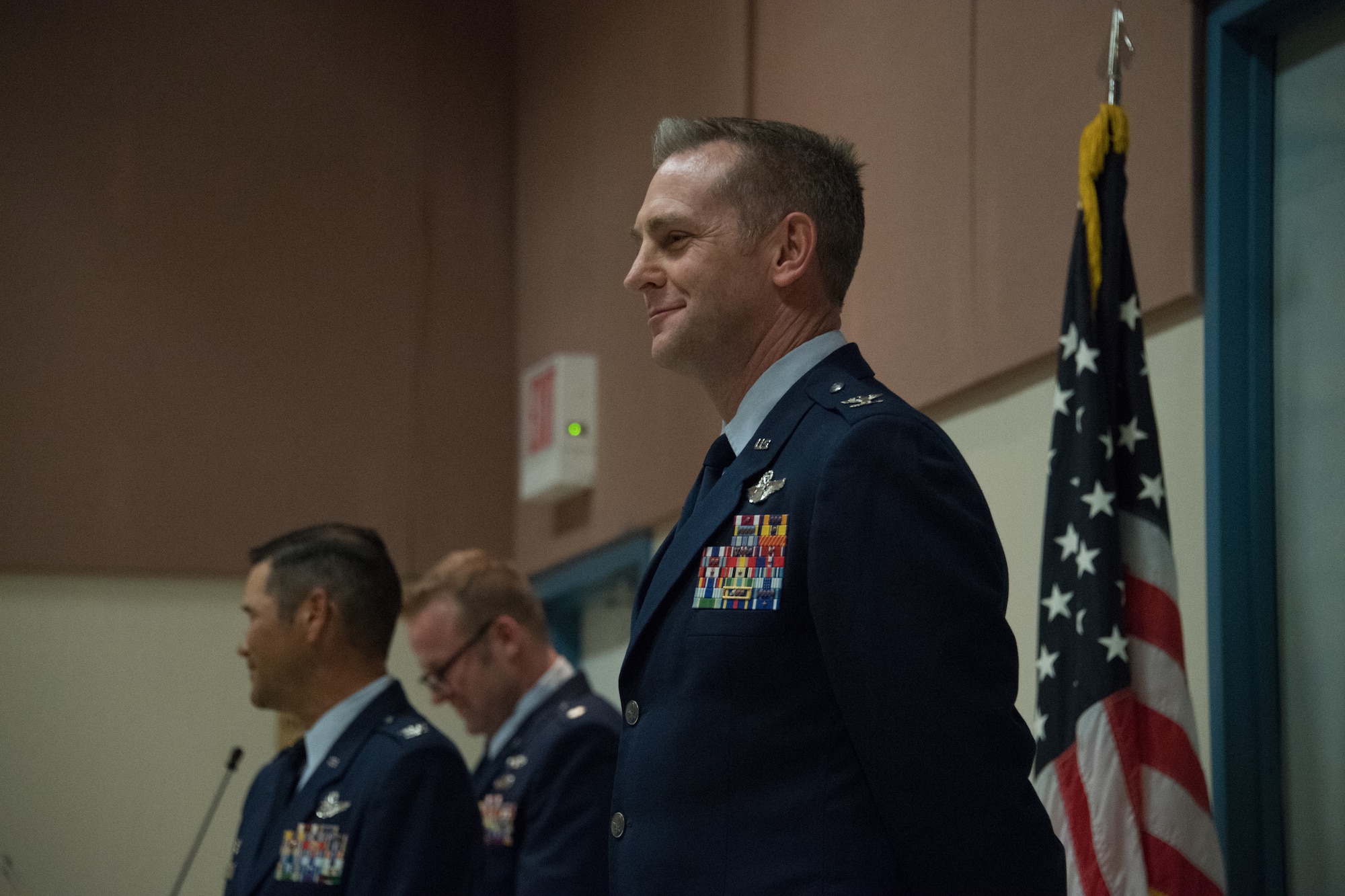 (Left) California Air National Guard Col. Keith Ward, Commander 146th Airlift Wing, speaks to a large crowd during the promotion ceremony of California Air National Guard Col. Christopher Dougherty (right) at the Channel Islands Air National Guard Station, California, February 8, 2020. (U.S. Air National Guard photo by Staff Sgt. Nicole Wright)