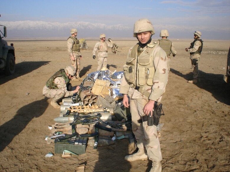 Keith Corcoran, an Airman First Class in security forces at the time, poses for a photo while on deployment to Afghanistan between 2004 and 2005.  Corcoran and his comrades provided installation security, protected convoys, interacted with local war lords, seized weapons caches and conducted humanitarian operations. (Courtesy Photo)