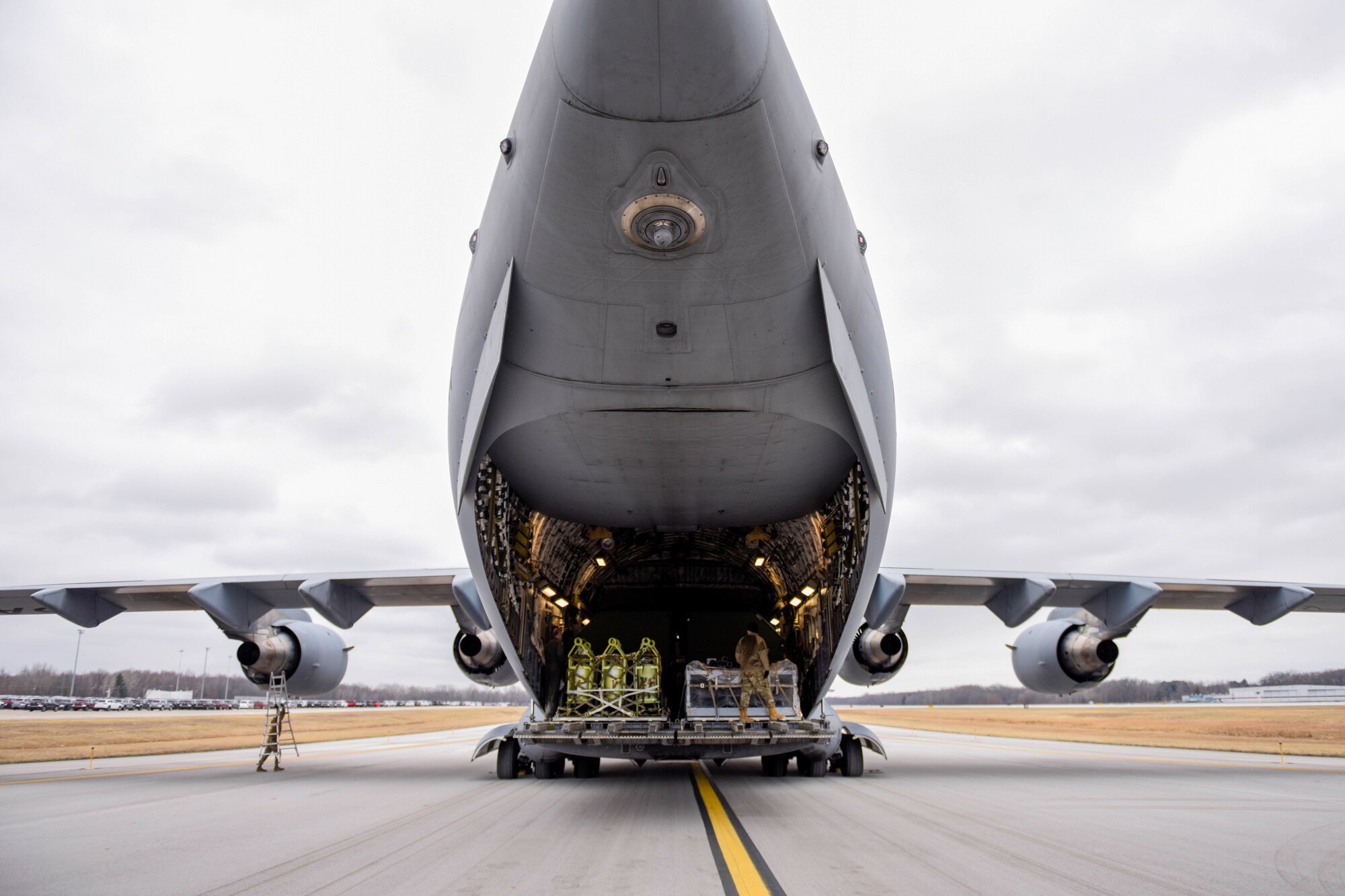 A C-17 assigned to the 167th Airlift Wing sits on the taxiway after being loaded at the 180th Fighter Wing, Feb. 4, 2020. The C-17 was loaded with equipment to support the 180FW's involvement in exercise Green Flag-West. Green flag is a realistic, Air-to-Surface, joint training exercise designed to improve interoperability between aircraft while supporting ground troops by allowing U.S. military branches, as well as other NATO and allied nations, an opportunity to work together, as they would in military operations around the world