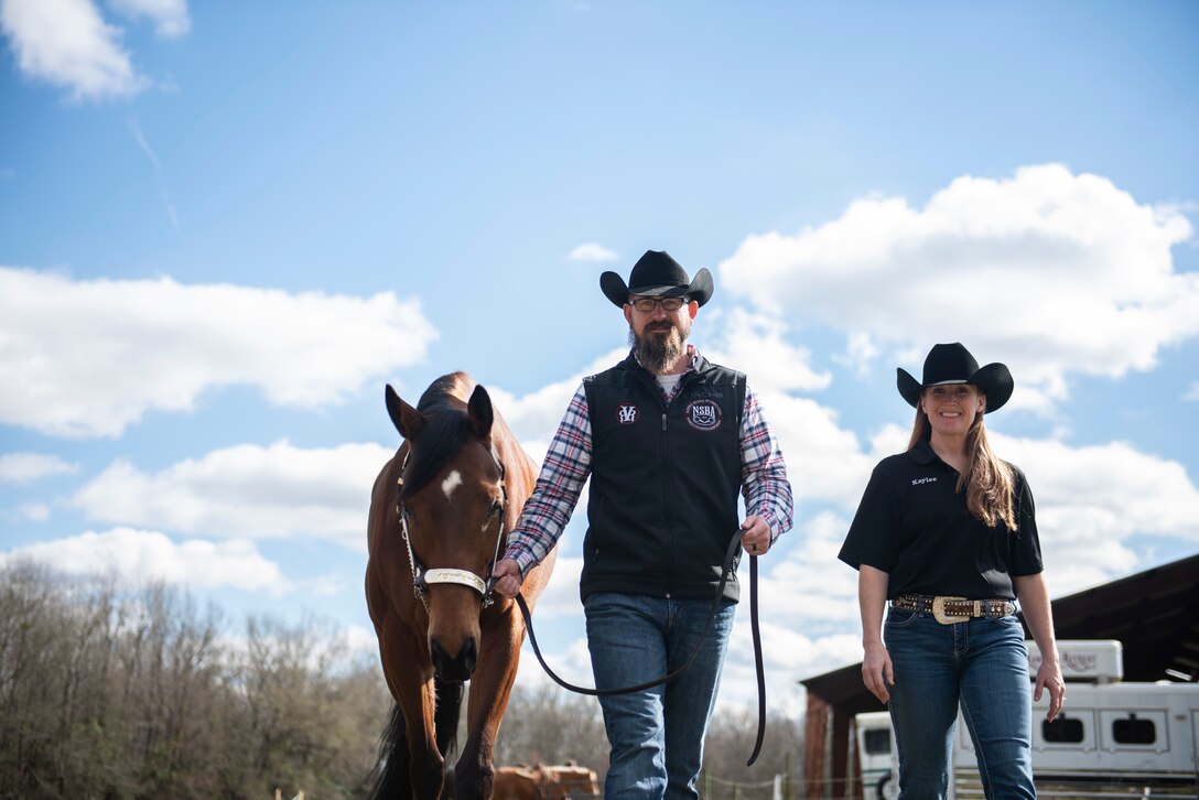 Ryan Bandy, 20th Security Forces Squadron security clerk and retired Army staff sergeant, left, and U.S. Air Force Maj. Kaylee Bandy, U.S. Army Central military police planner, walk their horse, Emma Jo, on a horse ranch in Dalzell, South Carolina, Jan. 26, 2020.