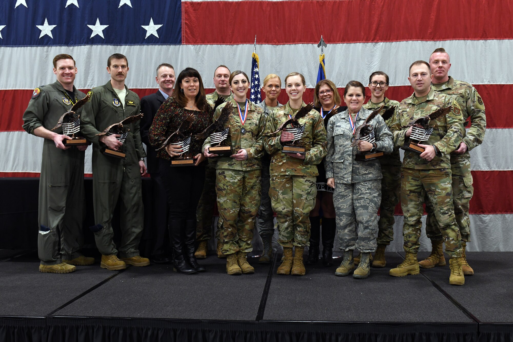 Winners from the 419th Fighter Wing's annual awards banquet take the stage Feb. 9 at Hill Air Force Base, Utah