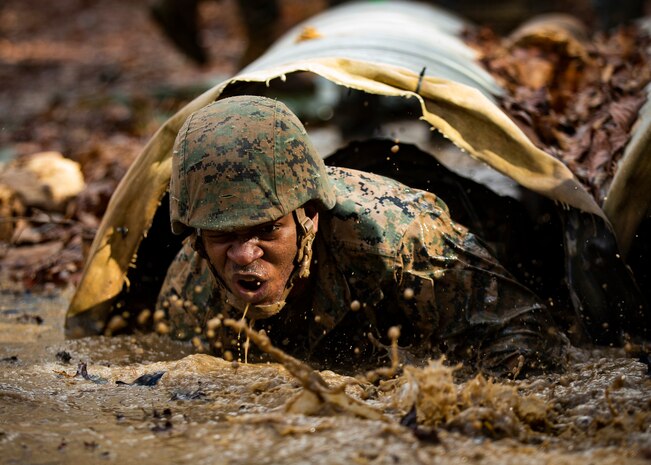 U.S. Marines from Corporals Course 615-20 with Combat Instructor Battalion go through the obstacle endurance course at Marine Corps Base Quantico, Quantico, Va., Feb. 7.