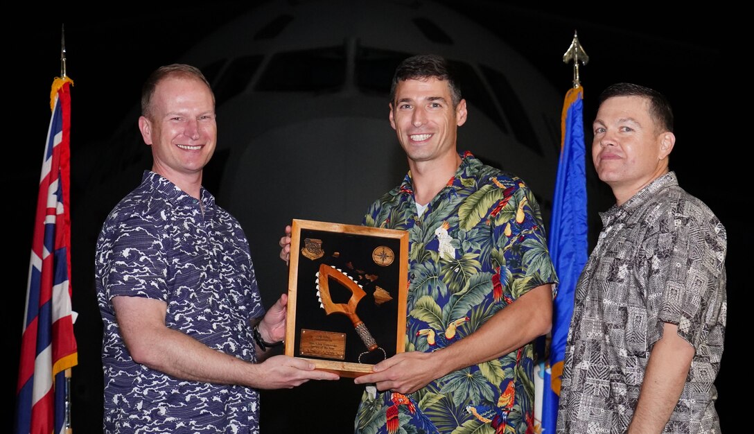 Nominee from the 15th Wing accepts award during the 15th Wing Annual Awards on Joint Base Pearl Harbor-Hickam, Hawaii, Feb. 7, 2020. Airmen and civilians are nominated by their leadership to win awards for various categories. (U.S. Air Force photo by Airman 1st Class Erin Baxter)