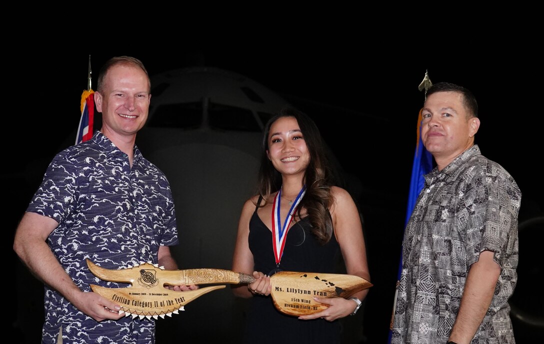 Nominee from the 15th Wing accepts award during the 15th Wing Annual Awards on Joint Base Pearl Harbor-Hickam, Hawaii, Feb. 7, 2020. Airmen and civilians are nominated by their leadership to win awards for various categories. (U.S. Air Force photo by Airman 1st Class Erin Baxter)