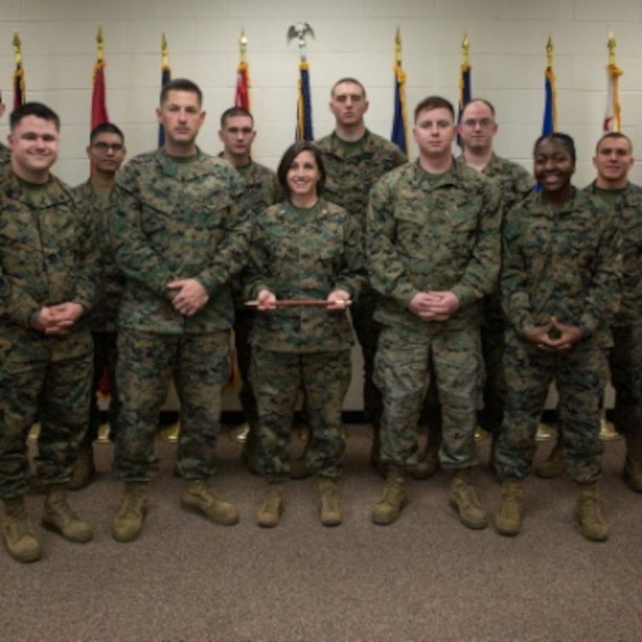 U.S. Marines with the Center for Naval Aviation Technical Training pose for a photo following the ribbon cutting ceremony for the RQ-21A Blackjack maintenance course at Marine Corps Air Station (MCAS) Cherry Point, North Carolina, Feb. 10, 2020. MCAS Cherry Point is the only Marine Corps Installation, as of now, that offers the RQ-21A Blackjack maintenance course. (U.S. Marine Corps photo by Cpl. Micha Pierce)