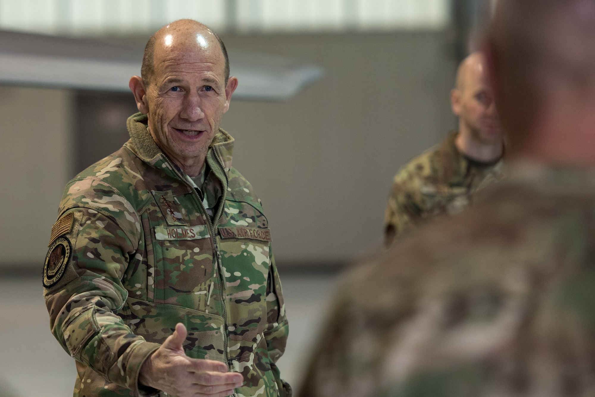 U.S. Air Force Gen. Mike Holmes, commander of Air Combat Command, speaks to Airmen of the 27th Fighter Squadron during a tour of the 1st FW at Joint Base Langley-Eustis, Virginia, Feb. 6, 2020.