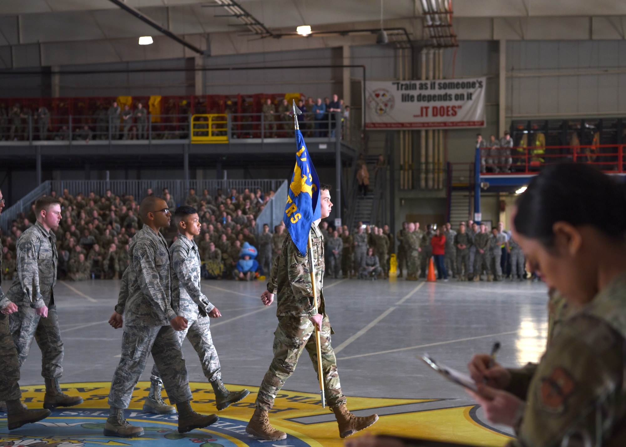 U.S. Air Force students from the 316th Training Squadron march during the 17th Training Group Drill Competition at the Louis F. Garland Department of Defense Fire Academy High Bay on Goodfellow Air Force Base, Texas, Feb. 7, 2020. The competing squadrons were judged based on military bearing, drill movement and executing precision. (U.S. Air Force photo by Airman 1st Class Abbey Rieves)