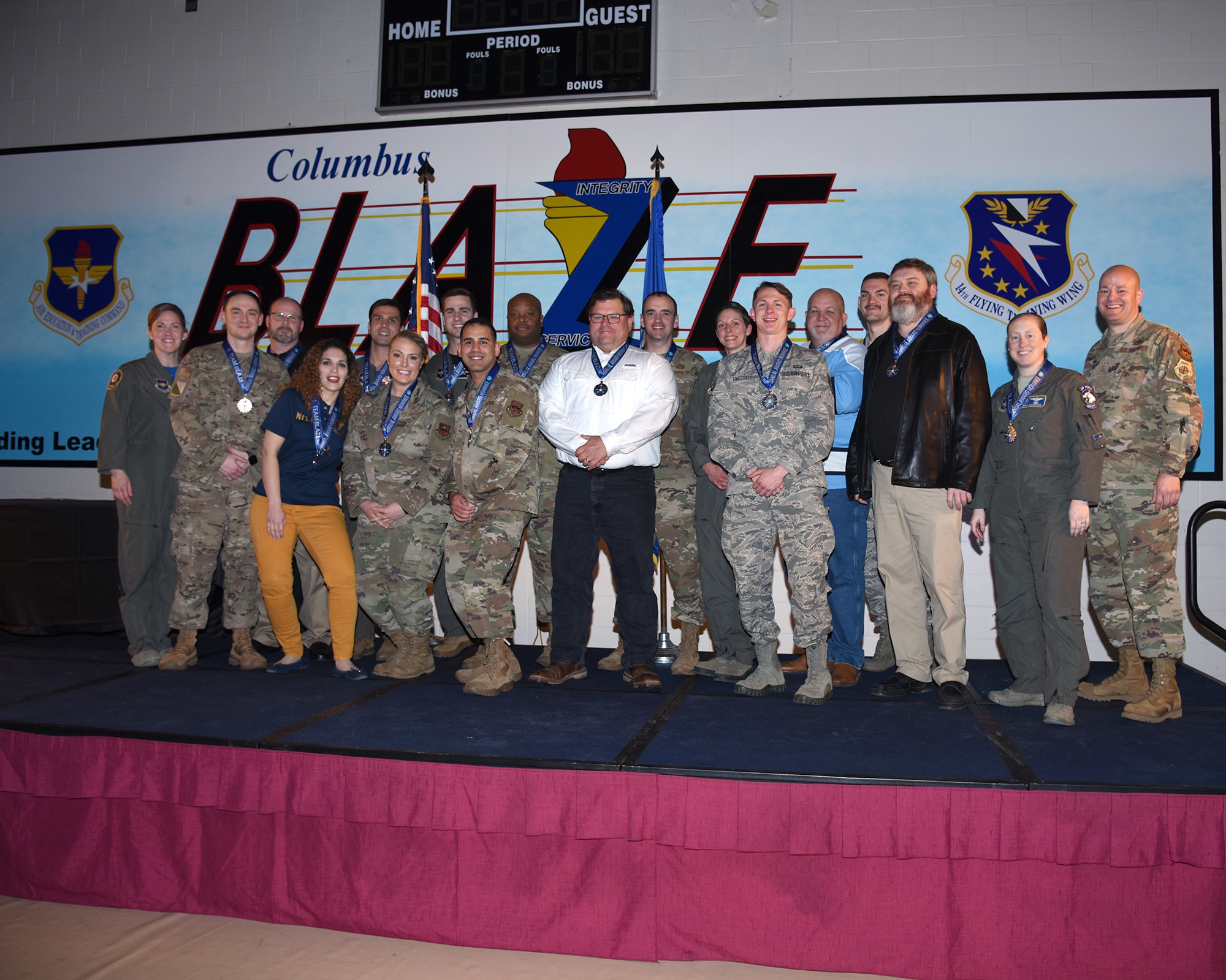 The 2019 14th Flying Training Wing’s Annual Award stand on stage after being presented their awards from 17 separate categories Feb. 9, 2020 on Columbus Air Force Base, Miss. (U.S. Air Force photo by Senior Airman Keith Holcomb)