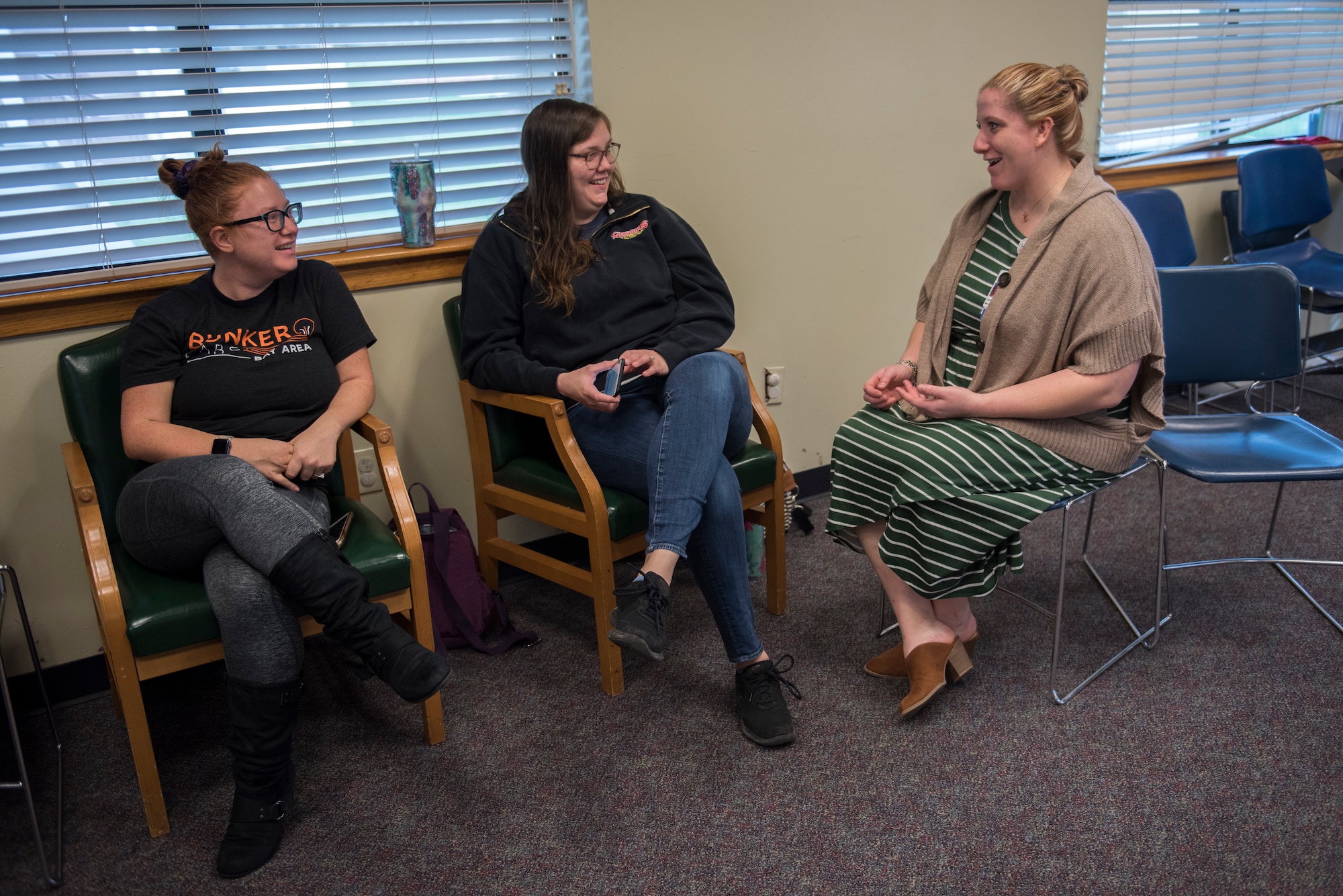 Karis Carbajal, right, 60th Medical Operations Squadron family advocacy nurse, speaks with Roxanne Mitchell, left, and Brittany Contreras, center, Air Force spouses, during a Family Advocacy playgroup Jan. 23, 2020, at Travis Air Force Base, California. The playgroup offers Travis AFB families with young children an opportunity to socialize on a weekly basis. (U.S. Air Force photo by Airman 1st Class Cameron Otte)