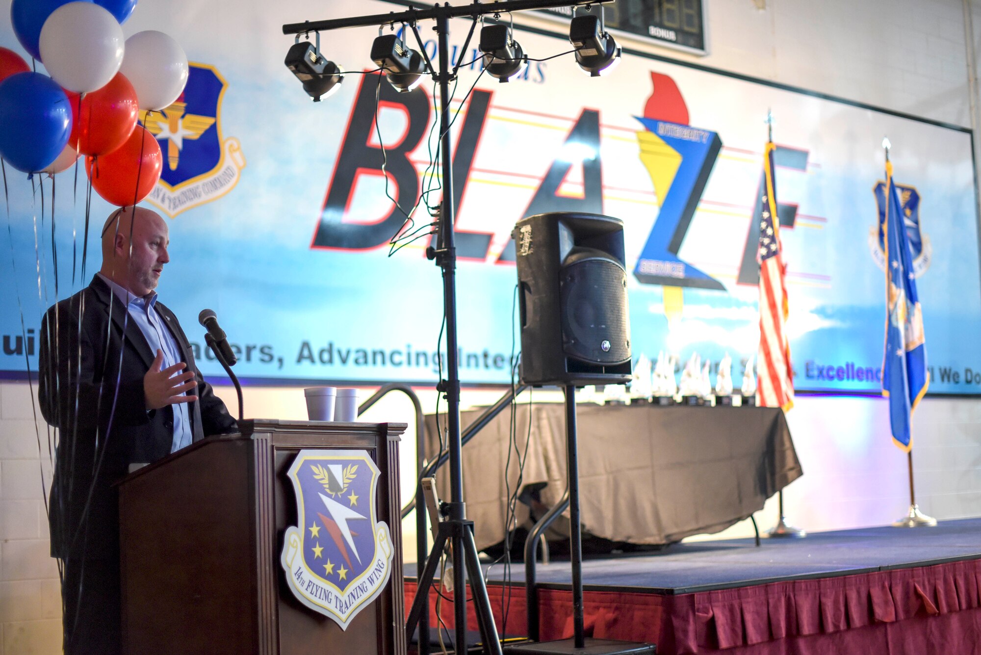 Jason Trufant, Mississippi University for Women’s athletics director, speaks at the 2019 14th Flying Training Wing’s Annual Awards Banquet Feb. 9, 2020, on Columbus Air Force Base, Miss. Trufant is the son and grandson of U.S. Air Force veterans and a community member involved with Team BLAZE. (U.S. Air Force photo by Senior Airman Keith Holcomb)