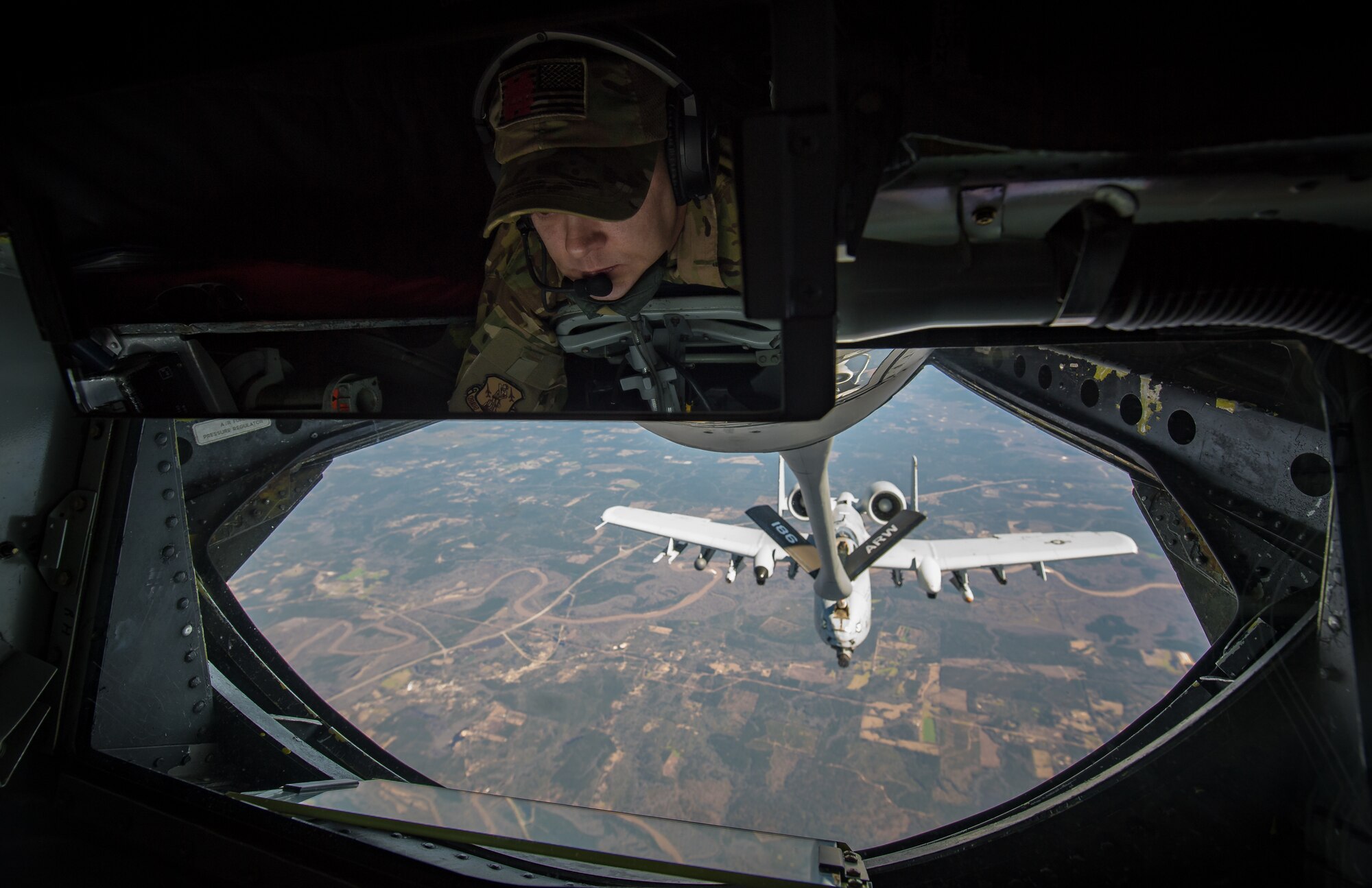 A U.S. Air Force KC-135 Stratotanker boom operator, assigned to the Mississippi Air National Guard 186th Air Refueling Wing, refuels an A-10 Thunderbolt II as part of Southern Strike 2020 over the Gulfport Combat Readiness Training Center, Miss., Feb. 7, 2020.