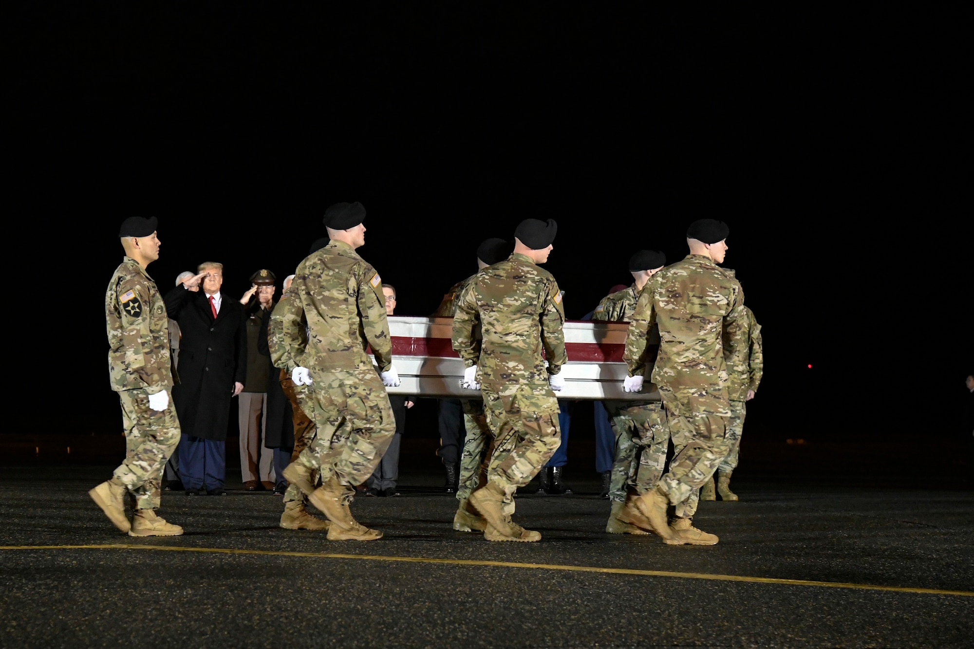 A U.S. Army carry team transfers the remains of Sgt. 1st Class Antonio R. Rodriguez, of Las Cruces, N.M., Feb. 10, 2020 at Dover Air Force Base, Del. Rodriguez was assigned to the 3rd Battalion, 7th Special Forces Group (Airborne), Eglin Air Force Base, Fla. (U.S. Air Force Photo by Senior Airman Eric M. Fisher)