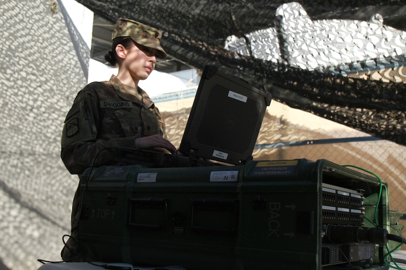 Spc. Annabell Dwiggins, 198th Expeditionary Signal Battalion (ESB), operates the Single Shelter Switch (SSS) during the monthly validation testing. Validation testing occurs every month to ensure that all communication equipment functions properly and also allows Soldiers to evaluate the communication systems and strive for continuous improvement to better support their end users.