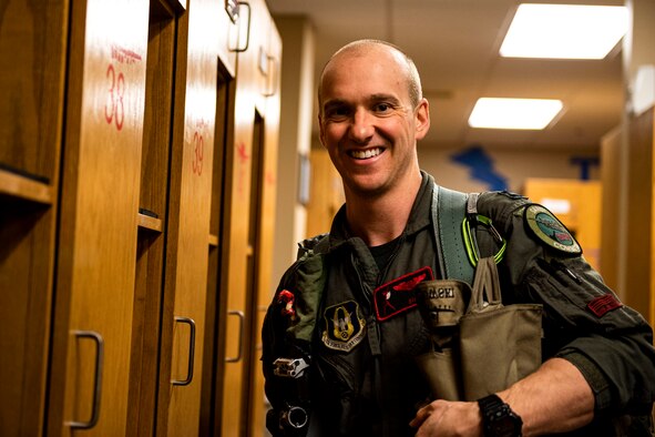 Photo of a pilot posing for a photo.