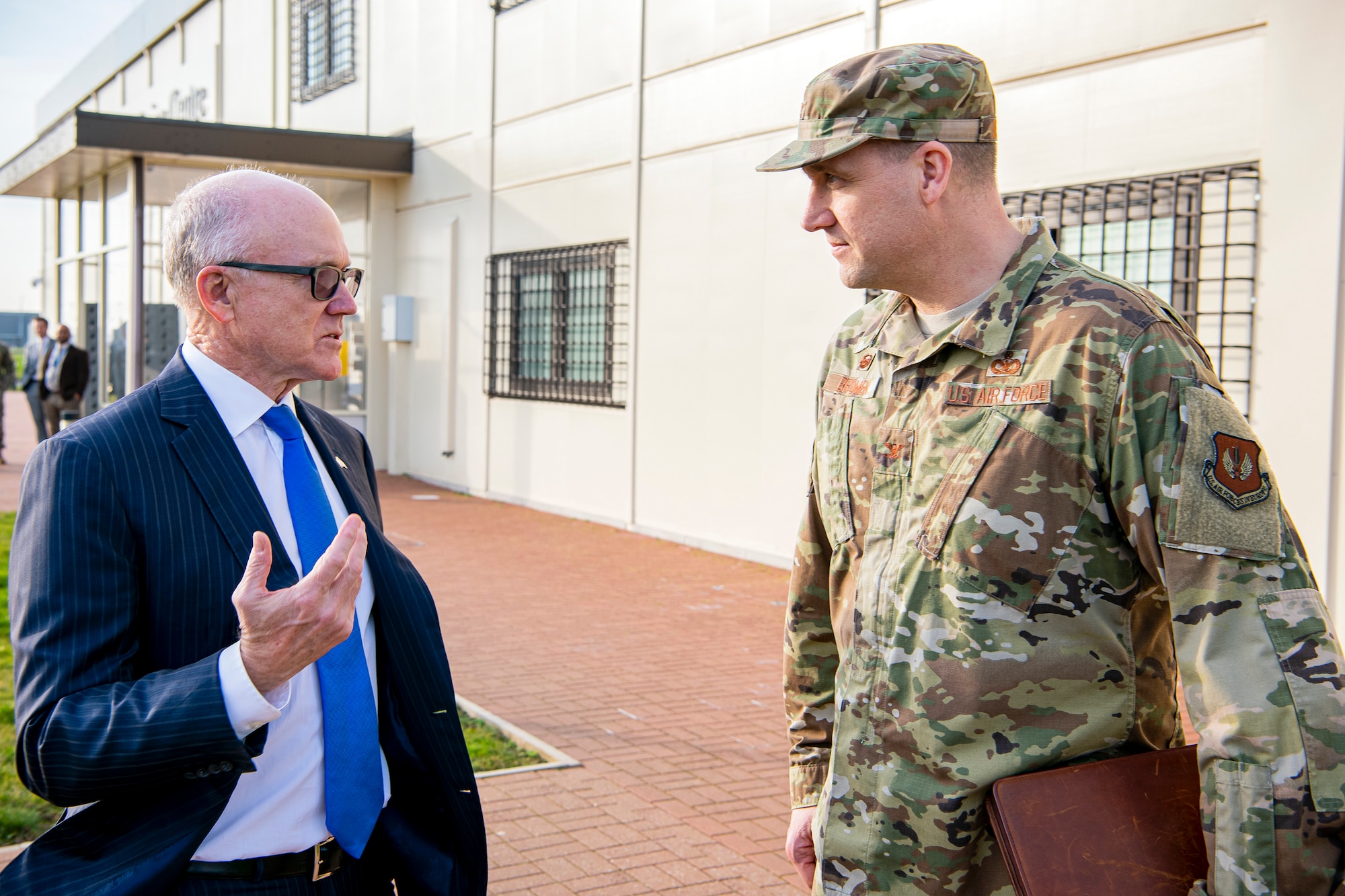 United States Ambassador to the United Kingdom, Robert Wood Johnson, (left), speaks with U.S. Air Force Col. Christopher Bromen, (right), 423d Air Base Group commander, during a visit to RAF Molesworth, England, Feb. 7, 2020. Johnson visited RAF Molesworth, which is part of the 501st Combat Support Wing, to build more relationships with personnel and gain a better understanding of their overall mission, capabilities and comprehensive duties. (U.S. Air Force photo by Senior Airman Eugene Oliver)