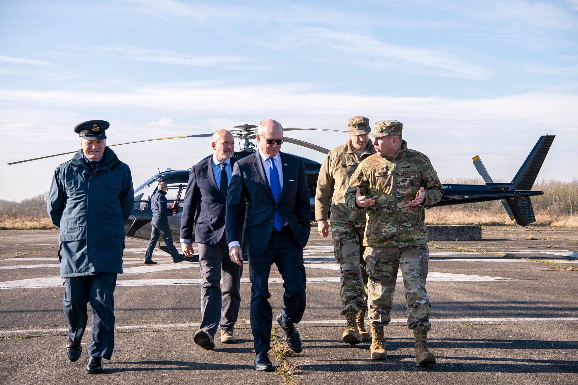 United States Ambassador to the United Kingdom, Robert Wood Johnson, (center), speaks with U.S. Air Force Col. Kurt Wendt, (right), 501st Combat Support Wing commander, during a visit to RAF Molesworth, England, Feb. 7, 2020. Johnson visited RAF Molesworth, which is part of the 501st Combat Support Wing, to build more relationships with personnel and gain a better understanding of their overall mission, capabilities and comprehensive duties. (U.S. Air Force photo by Senior Airman Eugene Oliver)