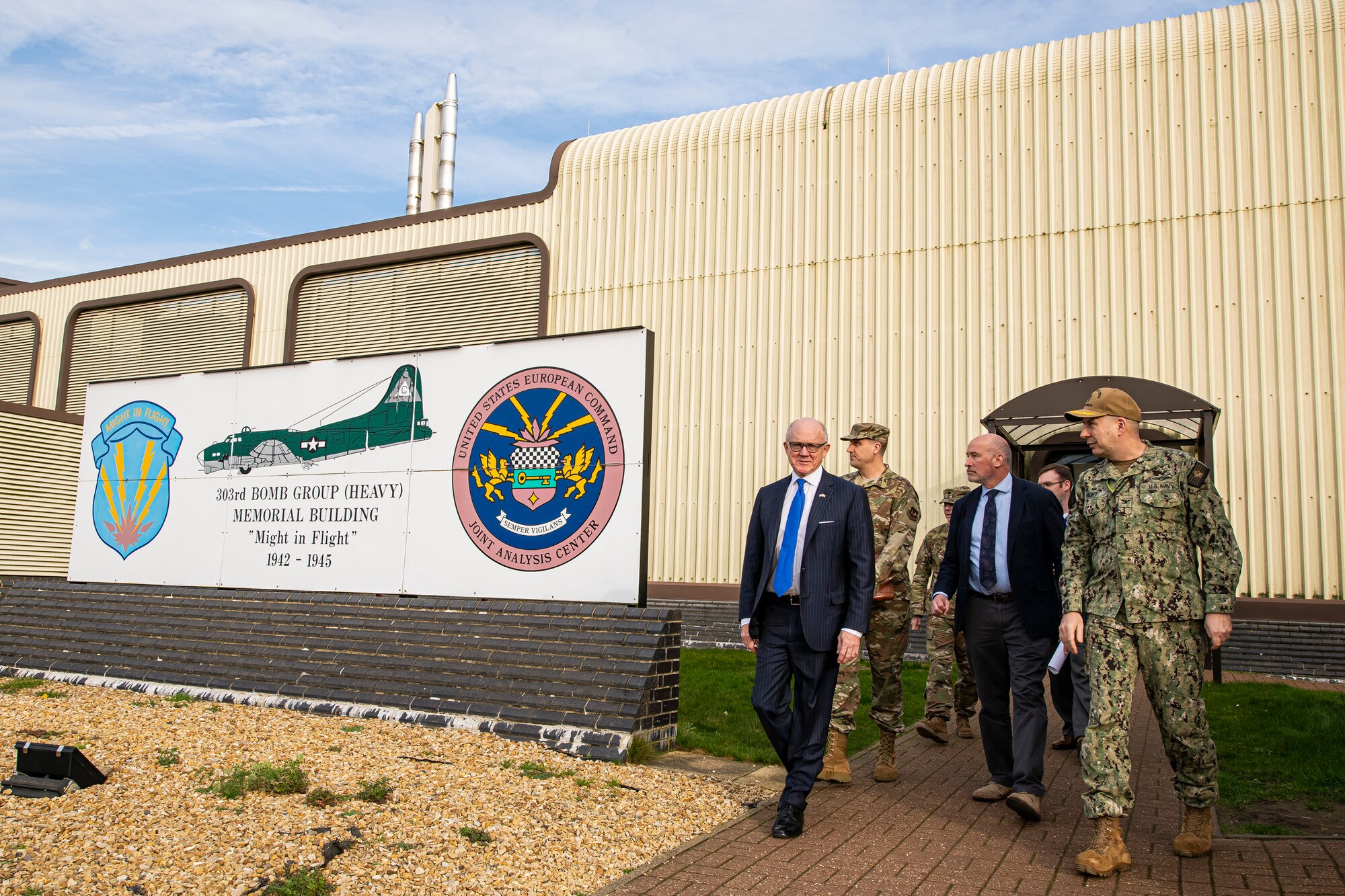 United States Ambassador to the United Kingdom, Robert Wood Johnson, (left), walks out of the Joint Intelligence Operations Center Europe Analytic Center, during a visit to RAF Molesworth, England, Feb. 7, 2020. Johnson visited RAF Molesworth, which is part of the 501st Combat Support Wing, to build more relationships with personnel and gain a better understanding of their overall mission, capabilities and comprehensive duties. (U.S. Air Force photo by Senior Airman Eugene Oliver)
