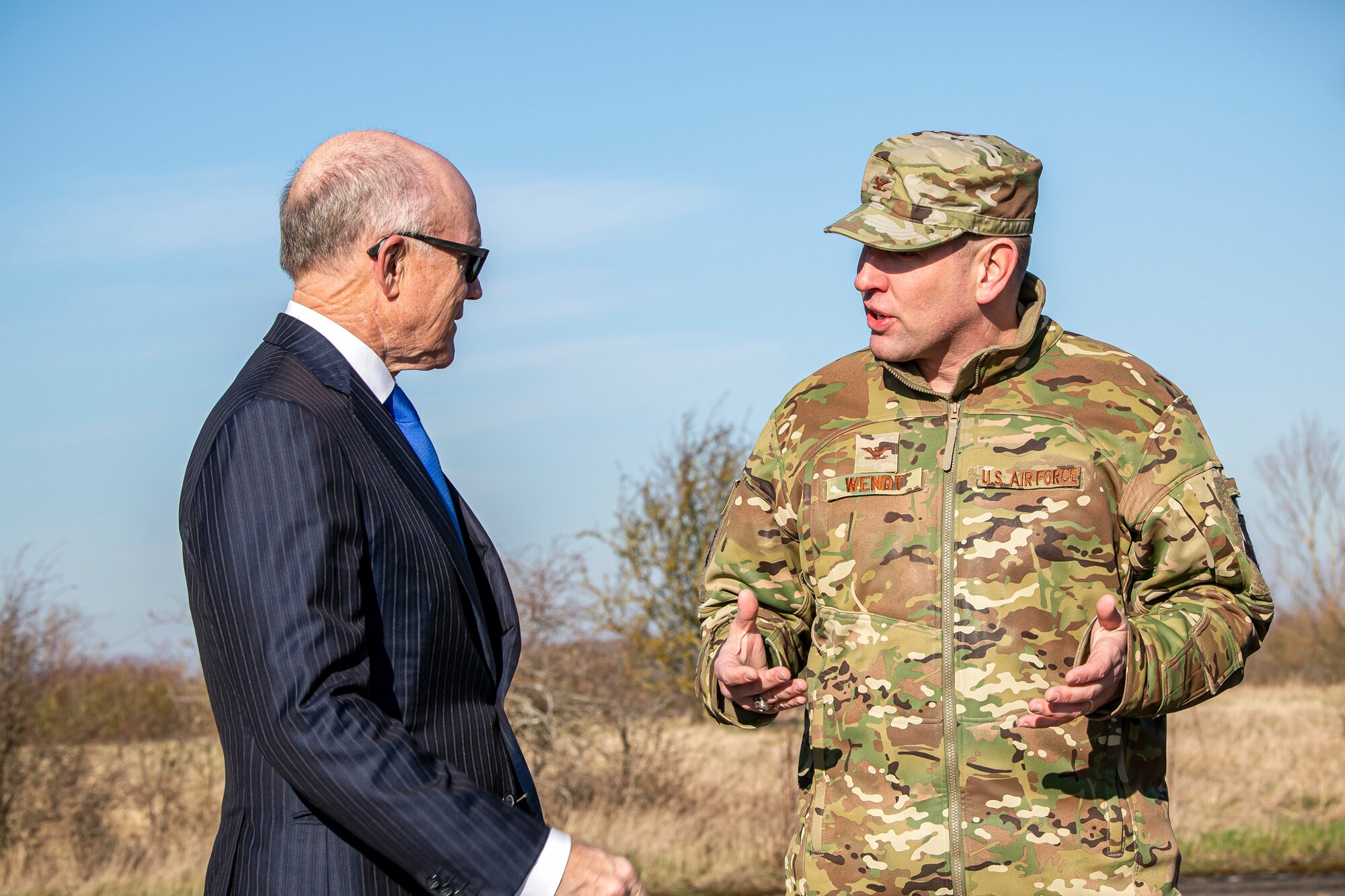 U.S. Air Force Col. Kurt Wendt, (right), speaks with United States Ambassador to the United Kingdom, Robert Wood Johnson, (left), during a visit to RAF Molesworth, England, Feb. 7, 2020. Johnson visited RAF Molesworth, which is part of the 501st Combat Support Wing, to build more relationships with personnel and gain a better understanding of their overall mission, capabilities and comprehensive duties. (U.S. Air Force photo by Senior Airman Eugene Oliver)