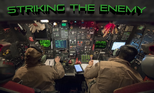 U.S. Air Force Capt. “Rannt” (left) and 1st Lt. “Comic” (right), 96th Bomb Squadron weapons systems officers, perform constant checks on their controls inside a U.S. Air Force 2nd Bomb Wing B-52H Stratofortress in support of Bomber Task Force Europe 20-1, Nov. 4, 2019, over Greece Air Space. This deployment allows aircrews and support personnel to conduct theater integration and to improve bomber interoperability with joint partners and allied nations. (U.S. Air Force photo by Tech. Sgt. Christopher Ruano)