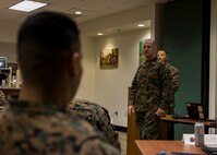 Colonel William C. Gray, commanding officer of 6th Maring Corps District, speaks to attendees of the staff noncommissioned officer in charge course 2-20 at the Four Winds Family Readiness Center aboard Marine Corps Recruit Depot Parris Island, South Carolina on Jan. 29, 2020. The course teaches new recruiting substation commanders everything they need to know about leading and managing Marine recruiters. (Marine Corps photo by Cpl. Jack A. E. Rigsby)
