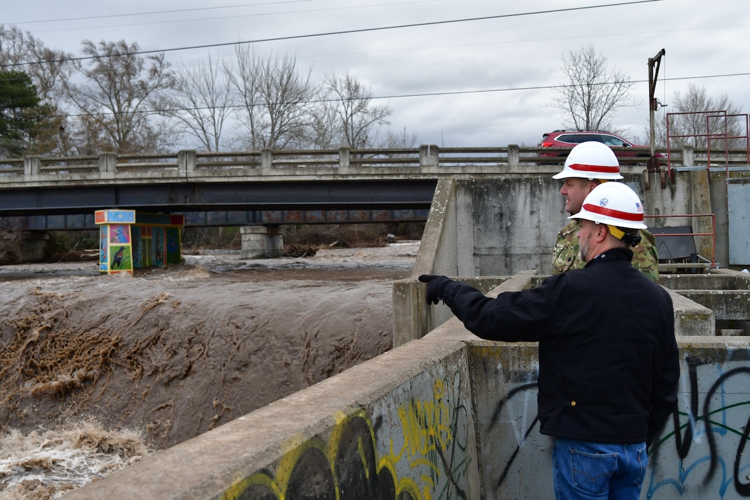 Lt. Col. Christian Dietz, Commander of the Walla Walla District Corps of Engineers, and the District's Chief of Engineering, Dwayne Weston, monitoring the Walla Walla River near Milton Freewater.