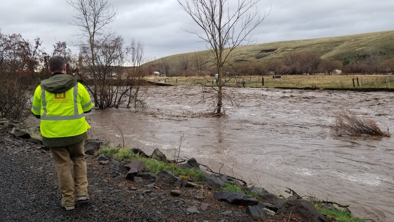 Corps official monitoring flows in Milton Freewater.