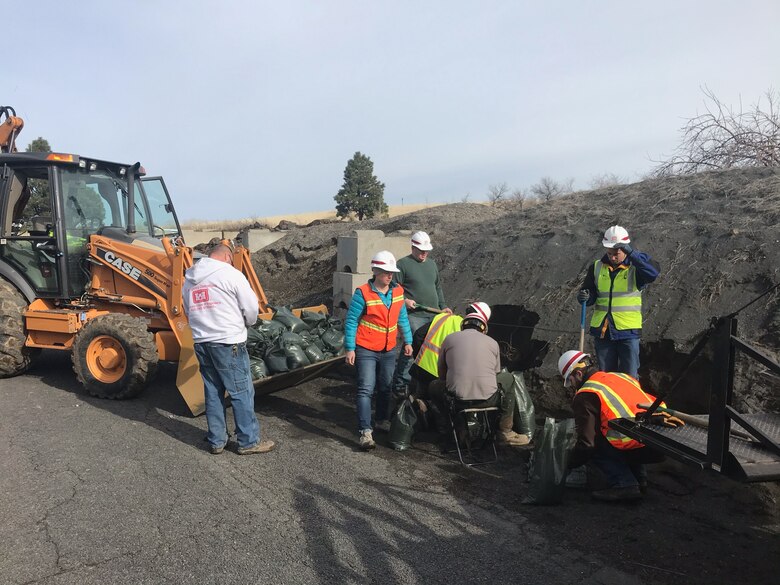 Sandbag operations for Russell Creek Diffuser on Sunday, Feb. 9.