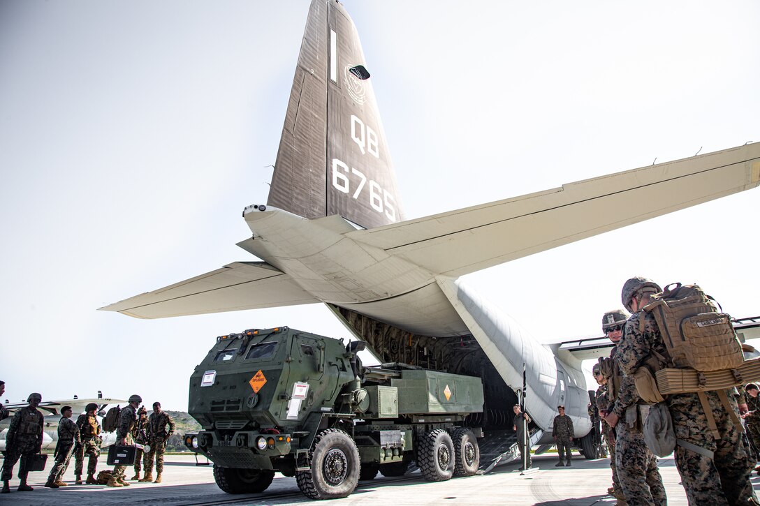 U.S. Marines with Marine Aerial Refueler Transport Squadron (VMGR) 352 load a High Mobility Artillery Rocket System into a KC-130J Hercules during Exercise Iron Fist 2020 on Marine Corps Air Station Camp Pendleton, California, Feb. 8. Exercise Iron Fist provides realistic, relevant training necessary for effective combined military operations. (U.S. Marine Corps Photo by Britany Rowlett)