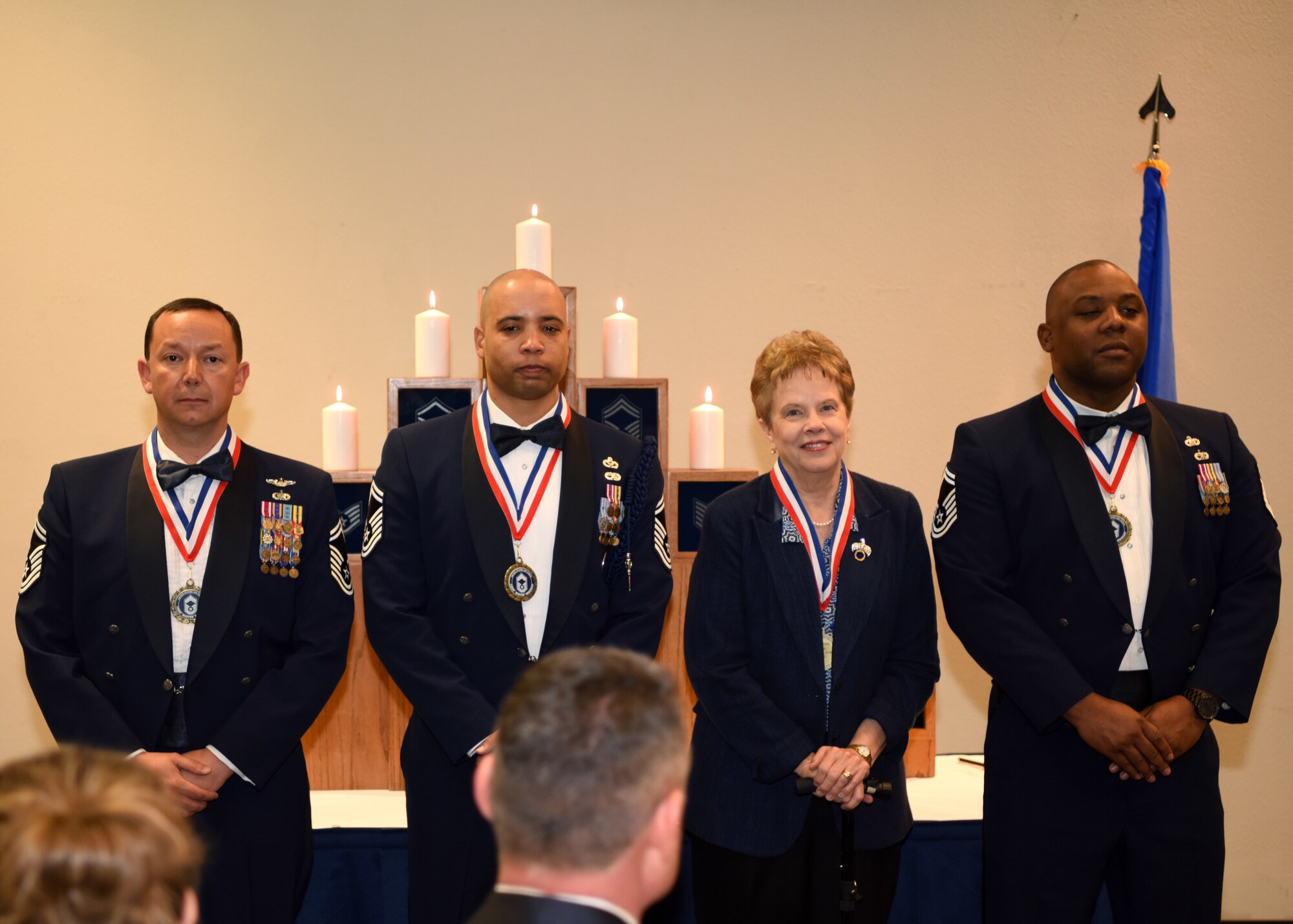 U.S. Air Force Chief Master Sergeant Selects and the newest Honorary Chief stand as they’re celebrated by family and friends at the event center on Goodfellow Air Force Base, Texas, Feb. 7, 2020. Chief Master Sergeant is the highest enlisted rank in the Air Force and only makes up 1% of the total enlisted force. (U.S. Air Force photo by Airman 1st Class Ethan Sherwood)