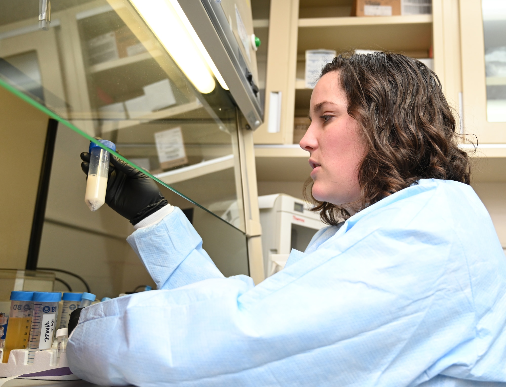 Mrs. Danyelle Long-Hyland, lab instructor assigned to United States Army Medical Research Institute of Infectious Disease, observes a training sample at Ft. Detrick, Frederick, Md. January 22, 2020. Long-Hyland teaches a three-week course to National Guard Civil Support Teams that teaches them how to use biological identification equipment that they will use in the field. (U.S. Air National Guard photo by Master Sgt. Chris Schepers)
