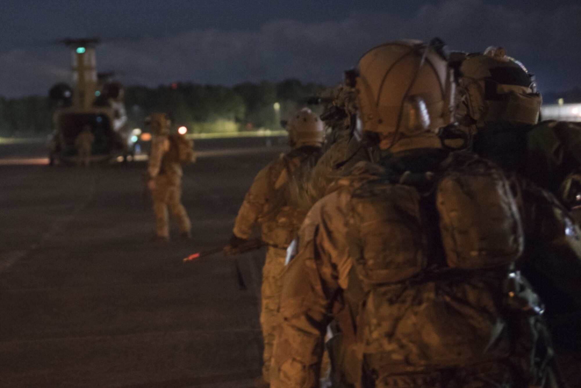 U.S. Air Force Special Tactics operators prepare to fly on a CH-47 Chinook helicopter before conducting a training mission at exercise Southern Strike 2020, at Gulfport Combat Readiness Training Center, Miss., Feb. 6, 2020. Southern Strike is a large-scale, joint and international combat exercise, which features counter insurgency, close air-support, en-route casualty care, non-combatant evacuation and maritime special operations.