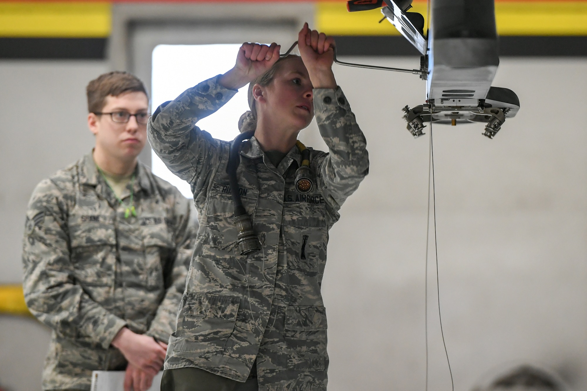 Airman prepares for a weapon load