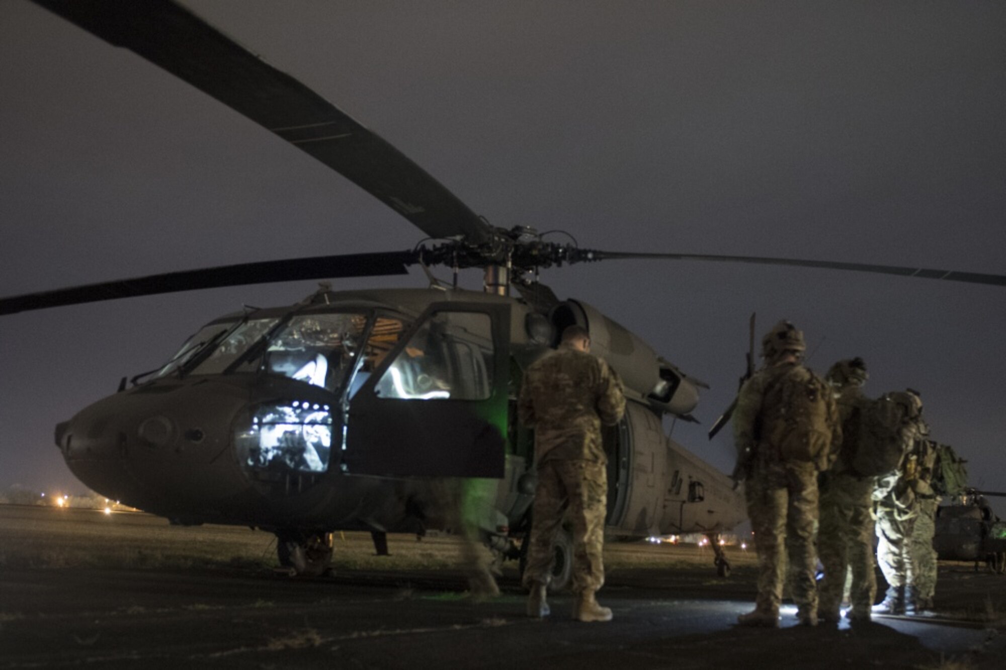 U.S. Air Force Special Tactics operators go over mission details with a U.S. Army UH-60 Black Hawk helicopter crew before conducting a direct action mission to kill or capture a high value individual during exercise Southern Strike 2020, at Camp McCain Training Center, Miss., Feb. 3, 2020. Southern Strike is a large-scale, joint and international combat exercise, featuring counter insurgency, close air-support, en-route casualty care, non-combatant evacuation and maritime special operations.