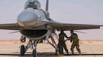 U.S. Airmen from the 380th Expeditionary Aircraft Maintenance Squadron remove a fuel hose from a U.S. Air Force F-16 Fighting Falcon during an engine-running refueling at Prince Sultan Air Base, Kingdom of Saudi Arabia, Feb. 7, 2020. Airmen at PSAB executed hot refueling capabilities by generating easily accessible fuel and rapidly returning the diverse aircraft set to the skies as part of an agile combat employment mission that exercised a critical capability of U.S. Air Forces Central Command. (U.S. Air Force photo by Senior Airman Giovanni Sims)