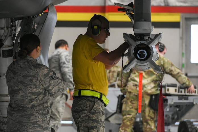 A photo of a weapons loading competition at Hill Air Force Base.
