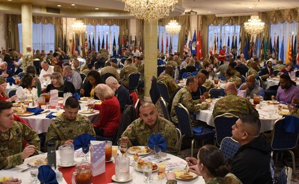 Guests eat breakfast during the National Prayer Breakfast event at Joint Base Langley-Eustis, Virginia, Feb. 11, 2020.