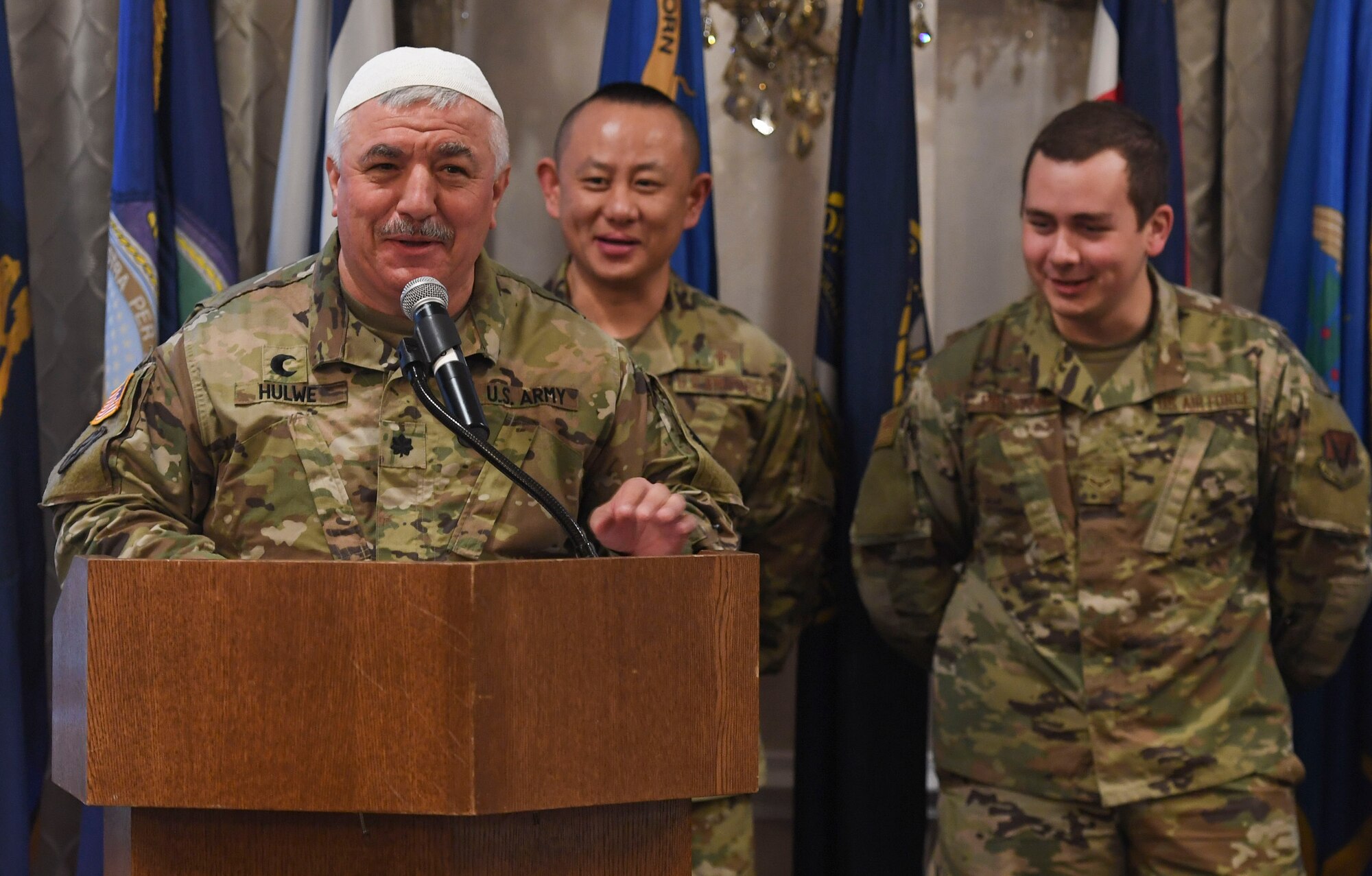 Chaplains assigned to the Fort Eustis Deputy Garrison Chaplain Office and the 633rd Air Base Wing Chaplain Office discuss acceptance during the National Prayer Breakfast event at Joint Base Langley-Eustis, Virginia, Feb. 11, 2020.